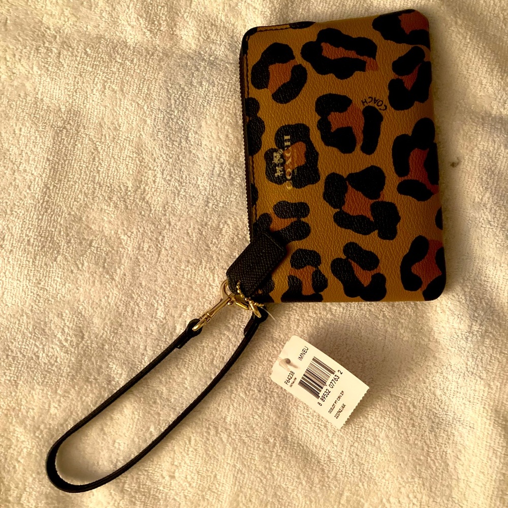 Coach cheetah print wrist
